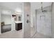 Beautiful bathroom featuring walk in shower, tile surround and dual sinks at 19026 W Becker Ln, Surprise, AZ 85388