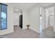 The entryway features an eye-catching tile pattern and modern lighting at 19026 W Becker Ln, Surprise, AZ 85388