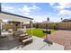 The home features a covered patio with desert landscaping, and a built-in grill at 19039 N 47Th Ave, Glendale, AZ 85308