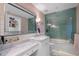 Stylish bathroom featuring marble countertops, tiled shower, and modern fixtures at 19296 N 98Th Pl, Scottsdale, AZ 85255