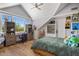 Inviting bedroom with a vaulted ceiling, desk area, and comfortable bed at 19296 N 98Th Pl, Scottsdale, AZ 85255