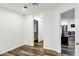 Bedroom featuring natural light, wood-look flooring and closet with slider doors at 195 N Cottonwood St # 26, Chandler, AZ 85225