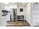Bright kitchen featuring stainless steel appliances, modern cabinets, and seamless access to dining area at 195 N Cottonwood St # 26, Chandler, AZ 85225