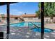 Community pool and spa with lounge chairs and a shallow end at 195 N Cottonwood St # 26, Chandler, AZ 85225