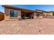 Extensive backyard featuring a covered patio, perfect for relaxation and entertaining at 1955 E Grand Canyon Dr, Chandler, AZ 85249