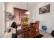 Breakfast nook with tile flooring, a charming pendant light and natural lighting at 1955 E Grand Canyon Dr, Chandler, AZ 85249