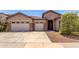 Charming single-Gathering home with a three-car garage and a well-manicured yard at 1955 E Grand Canyon Dr, Chandler, AZ 85249