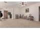 Spacious living room with carpet flooring, neutral walls and ample natural light at 1955 E Grand Canyon Dr, Chandler, AZ 85249