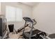Bright spare room featuring workout equipment and a window providing natural light at 1955 E Grand Canyon Dr, Chandler, AZ 85249