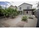 Large private backyard featuring a covered patio, beautiful paverwork, and mature trees at 20221 N 31St St, Phoenix, AZ 85050