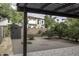 View of the backyard featuring a patio, privacy wall, and storage shed at 20221 N 31St St, Phoenix, AZ 85050