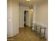 Hallway with tile floors and a glass console table at 20221 N 31St St, Phoenix, AZ 85050