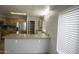 Kitchen features wood cabinets, stainless steel appliances and a bar at 20221 N 31St St, Phoenix, AZ 85050
