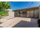 Backyard patio featuring outdoor seating, desert landscaping and a shaded privacy screen at 2041 W Pierson St, Phoenix, AZ 85015