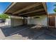 Open carport parking space with shaded covering, and easy access to community amenities at 2041 W Pierson St, Phoenix, AZ 85015