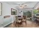 Dining area includes a table with chairs and a sliding glass door at 2041 W Pierson St, Phoenix, AZ 85015
