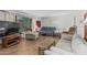 Bright living room featuring comfortable seating and a large window at 2041 W Pierson St, Phoenix, AZ 85015