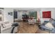 Spacious living room with tile floors, comfortable furniture, and natural light at 2041 W Pierson St, Phoenix, AZ 85015