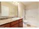Well-lit bathroom with vanity, granite counters, and shower/tub combo at 2134 E Broadway Rd # 1062, Tempe, AZ 85282