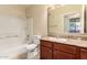 Bathroom featuring a vanity with granite countertop and a shower/tub combo at 2134 E Broadway Rd # 1062, Tempe, AZ 85282