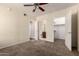 Spacious carpeted bedroom with doors to bathroom and walk-in closet at 2134 E Broadway Rd # 1062, Tempe, AZ 85282