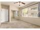 Cozy carpeted bedroom with mirrored closet doors and bright window at 2134 E Broadway Rd # 1062, Tempe, AZ 85282