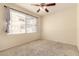 Bedroom with neutral paint, plush carpet and window that allows natural light at 2134 E Broadway Rd # 1062, Tempe, AZ 85282