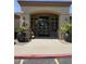 Charming clubhouse entrance featuring decorative planters at 2134 E Broadway Rd # 1062, Tempe, AZ 85282