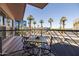 Charming balcony featuring city views, palm trees, and a cozy seating area at 2201 N Central Ave # 3C, Phoenix, AZ 85004