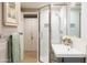 Bathroom showcasing a glass-enclosed shower, modern vanity, and stylish decor at 2201 N Central Ave # 3C, Phoenix, AZ 85004