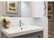 Stylish bathroom featuring a modern vanity, decorative mirror, and elegant fixtures at 2201 N Central Ave # 3C, Phoenix, AZ 85004