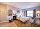 Inviting bedroom featuring a comfortable bed, ample natural light, and stylish furnishings at 2201 N Central Ave # 3C, Phoenix, AZ 85004