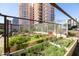 Picturesque raised garden beds with a high-rise building in the background at 2201 N Central Ave # 3C, Phoenix, AZ 85004