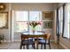 Cozy dining area with seating for four and a window view at 2201 N Central Ave # 3C, Phoenix, AZ 85004