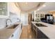 Elegant kitchen with sleek countertops, stainless steel appliances, and white cabinetry at 2201 N Central Ave # 3C, Phoenix, AZ 85004