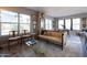 Spacious living room features large windows, stylish sofa, and open layout for entertaining at 2201 N Central Ave # 3C, Phoenix, AZ 85004
