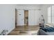 Bedroom with an ensuite bathroom and custom sliding barn door at 22709 S 202Nd St, Queen Creek, AZ 85142