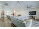 Open-concept living area seamlessly connects the kitchen and living room, creating an inviting atmosphere at 22709 S 202Nd St, Queen Creek, AZ 85142