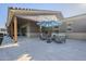 Wide view of the outdoor patio with stylish seating, a large umbrella, and seamless access to the backyard at 22709 S 202Nd St, Queen Creek, AZ 85142