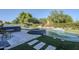 Backyard pool and spa with outdoor dining and kitchen, perfect for entertaining at 22709 S 202Nd St, Queen Creek, AZ 85142