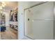 Walk-in shower featuring custom glass door and white subway tiles at 22709 S 202Nd St, Queen Creek, AZ 85142
