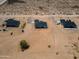 Wide aerial shot of homes with dark roofs amid desert landscape at 2689 S 305Th Ave Ave, Buckeye, AZ 85326