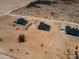 Wide aerial view of multiple new homes in a desert setting at 2689 S 305Th Ave Ave, Buckeye, AZ 85326