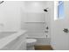 Bathroom with a tub and shower combination, white subway tile surround, and marble countertop vanity at 2689 S 305Th Ave Ave, Buckeye, AZ 85326