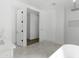 Bright bathroom featuring marble floors, walk-in shower and soaking tub at 2689 S 305Th Ave Ave, Buckeye, AZ 85326