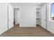 Spacious bedroom featuring new floors and access to both a closet and additional room at 2689 S 305Th Ave Ave, Buckeye, AZ 85326