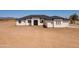 New home with a modern design, featuring a dark roof and bright white accents at 2689 S 305Th Ave Ave, Buckeye, AZ 85326