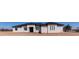 Beautiful single Gathering home featuring a modern design, desert landscaping, and dark accents on the roof and windows at 2689 S 305Th Ave Ave, Buckeye, AZ 85326