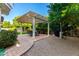 Backyard patio with a pergola, a dining area, and a barbecue grill, perfect for outdoor entertaining at 2879 E Austin Dr, Gilbert, AZ 85296