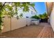 Low-maintenance backyard with gravel and brick accents, featuring a shed for storage at 2879 E Austin Dr, Gilbert, AZ 85296